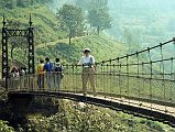 Kathmandu Valley 3 Chobar Gorge 03 Charlotte On Bridge Over Chobar Gorge 1991 Charlotte Ryan poses on the narrow suspension bridge built in Aberdeen, Scotland in 1903 spanning the Chobar Gorge.